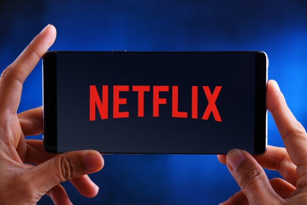 vpn services purevpn unlock netflix streaming services hands holding smartphone with netflix on